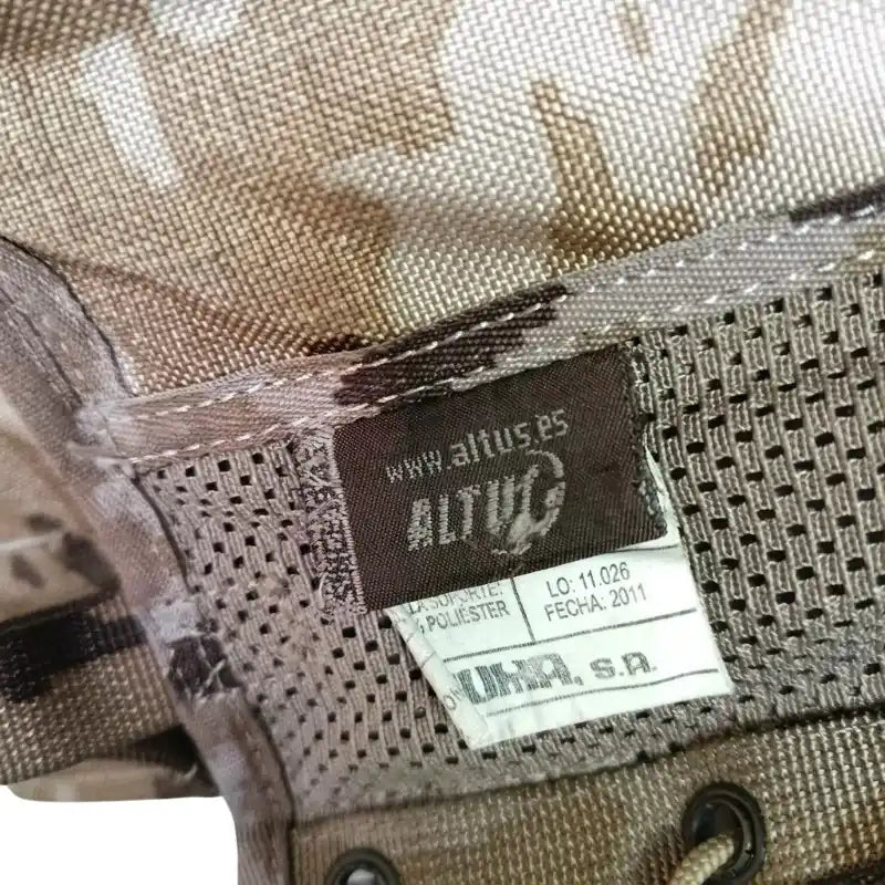 Etiqueta interior de chaleco táctico con talla M y composición de poliéster
