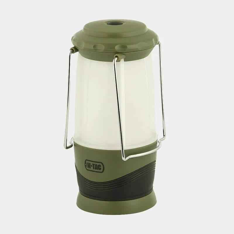 Linterna portátil con cuerpo translúcido blanco y asa metálica, acabado verde mate
