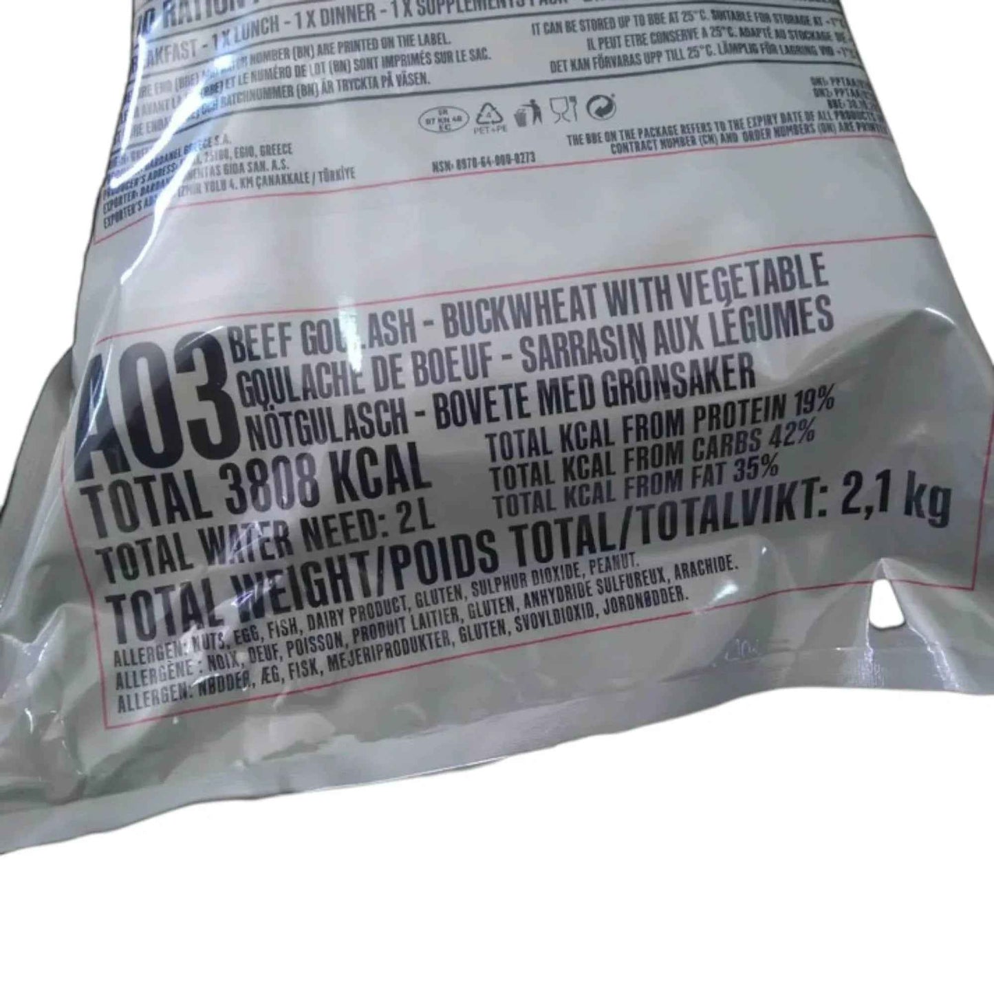 Bolsa de ración militar plateada con números 103 y datos nutricionales